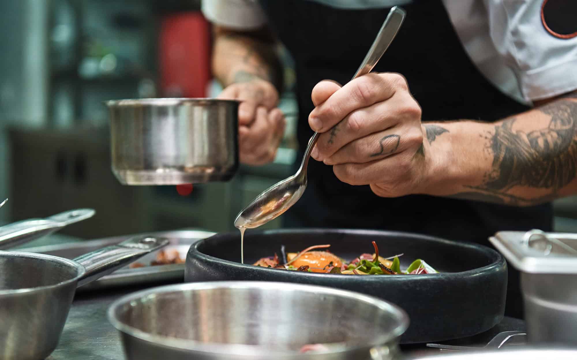 Front View Of Chef Plating Food